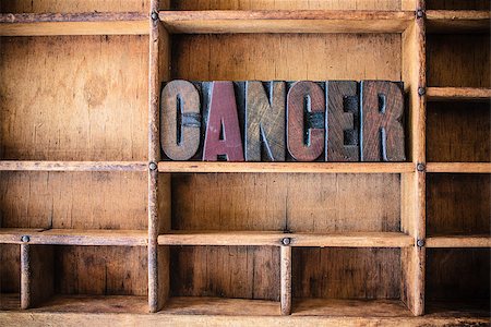 retro surgery - The word CANCER written in vintage wooden letterpress type in a wooden type drawer. Stock Photo - Budget Royalty-Free & Subscription, Code: 400-08156345