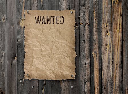 Wild West wanted poster on weathered plank wood wall Stock Photo - Budget Royalty-Free & Subscription, Code: 400-08158783