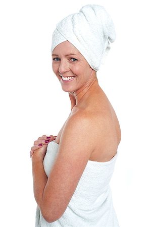 Studio shot of smiling spa woman wearing bathing towel. Photographie de stock - Aubaine LD & Abonnement, Code: 400-08152094