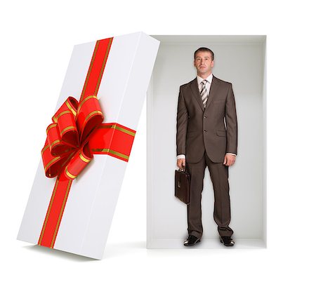 empty suitcase - Businessman with suitcase in gift box with ribbon on isolated white background Stock Photo - Budget Royalty-Free & Subscription, Code: 400-08164857