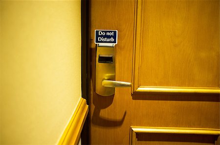 simsearch:400-04617631,k - Cropped image of hotel room with do not disturb tag on door knob Stock Photo - Budget Royalty-Free & Subscription, Code: 400-08185176