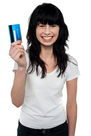 simsearch:400-06858518,k - Cheerful brunette with long hair holding up cash card. Isolated against white. Stock Photo - Budget Royalty-Free & Subscription, Code: 400-08185949