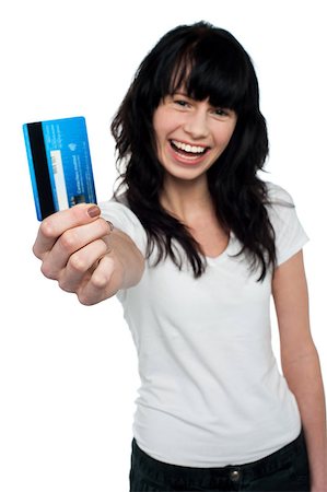 simsearch:400-06858518,k - Cheerful woman with long hair displaying her cash card to you. Stock Photo - Budget Royalty-Free & Subscription, Code: 400-08185950