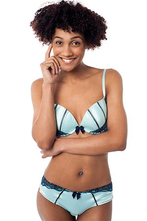 simsearch:400-06422339,k - Portrait of a sensuous young smiling woman in bikini isolated over white background. Foto de stock - Super Valor sin royalties y Suscripción, Código: 400-08186011