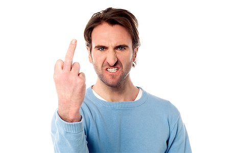 simsearch:400-06073389,k - Evil gesture by angry young man Stock Photo - Budget Royalty-Free & Subscription, Code: 400-08187010