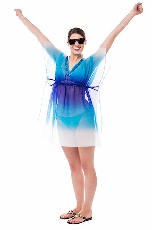 simsearch:400-06481645,k - Stylish young female model throwing up her hands in excitement. Stock Photo - Budget Royalty-Free & Subscription, Code: 400-08187293