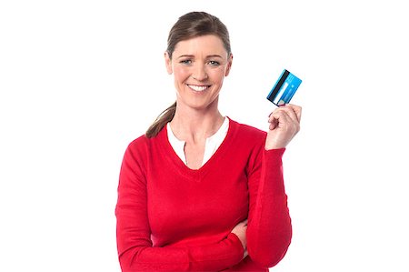 simsearch:400-06858518,k - Smiling isolated woman displaying her credit card Stock Photo - Budget Royalty-Free & Subscription, Code: 400-08187405