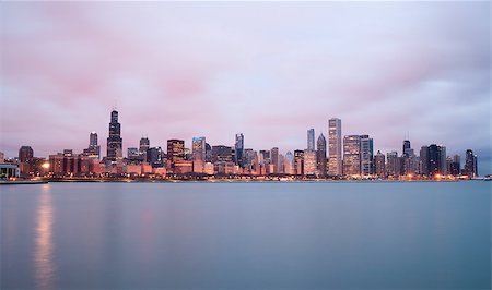 A beautiful pink sunrise lights the long downtown Chicago skyline Stock Photo - Budget Royalty-Free & Subscription, Code: 400-08221418