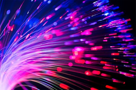 fibre optic - bunch of optical fibres flying from deep as blurred abstract technology background Stock Photo - Budget Royalty-Free & Subscription, Code: 400-08222316