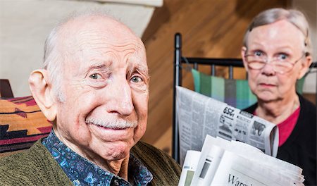 Elderly man and woman with the newspaper indoors Stock Photo - Budget Royalty-Free & Subscription, Code: 400-08254996