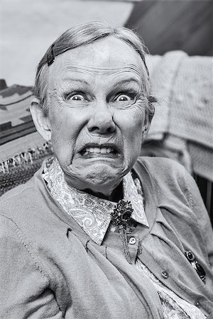 simsearch:400-07221782,k - Elderly woman making a scary face at the camera Stock Photo - Budget Royalty-Free & Subscription, Code: 400-08255839