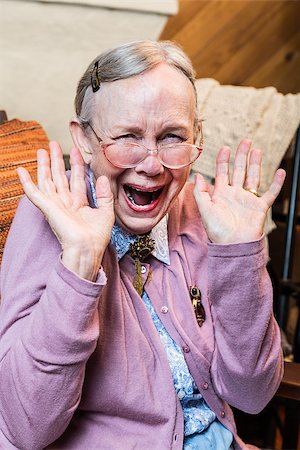 simsearch:400-07221782,k - Happy old woman with a hands up gesture Stock Photo - Budget Royalty-Free & Subscription, Code: 400-08255842