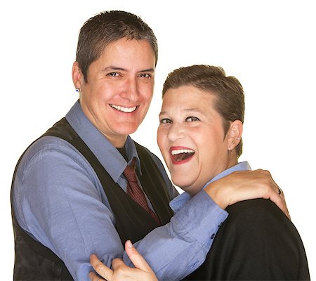 simsearch:400-06204561,k - Joking lesbian couple in blue shirts on isolated background Stock Photo - Budget Royalty-Free & Subscription, Code: 400-08250372