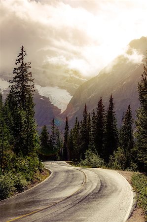 simsearch:400-07823385,k - Mountain road in backlight with dreamy filtered effect and lens flare Stock Photo - Budget Royalty-Free & Subscription, Code: 400-08250692