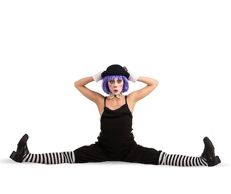 Funny clown dancer makes a big split Stock Photo - Budget Royalty-Free & Subscription, Code: 400-08252767