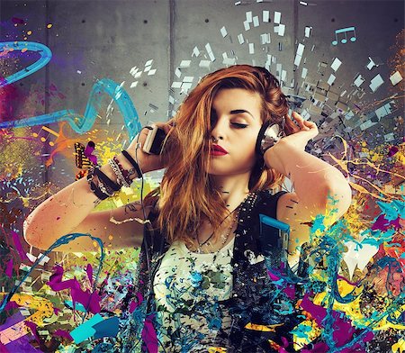 Girl listen to music between colorful notes Stock Photo - Budget Royalty-Free & Subscription, Code: 400-08253188