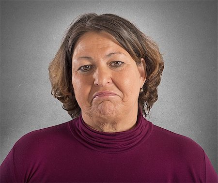 simsearch:400-04902701,k - Portrait of woman with a sad expression Stock Photo - Budget Royalty-Free & Subscription, Code: 400-08253733