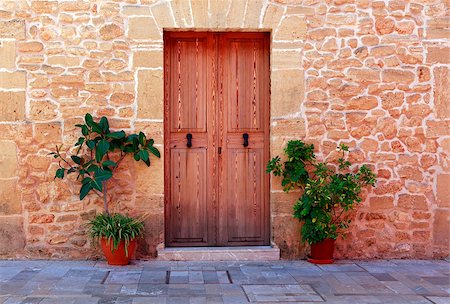 simsearch:400-06065362,k - Wooden door of an old stone house, Spain Photographie de stock - Aubaine LD & Abonnement, Code: 400-08253921