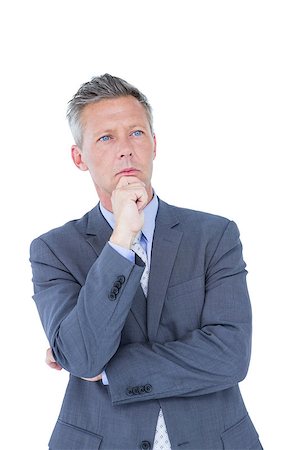 simsearch:400-04283915,k - Businessman thinking with hand on chin against a white background Stock Photo - Budget Royalty-Free & Subscription, Code: 400-08264386
