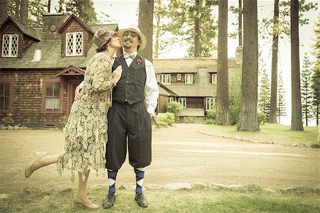 roaring twenties - Attractive 1920s Dressed Romantic Couple in Front of Old Cabin Portrait. Stock Photo - Budget Royalty-Free & Subscription, Code: 400-08261904