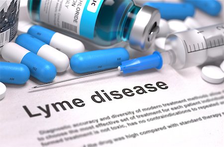 Lyme Disease - Printed Diagnosis with Blurred Text. On Background of Medicaments Composition - Blue Pills, Injections and Syringe. Stock Photo - Budget Royalty-Free & Subscription, Code: 400-08285754