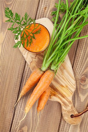 simsearch:400-06864386,k - Fresh vegetable smoothie. Carrot juice. Top view Stock Photo - Budget Royalty-Free & Subscription, Code: 400-08287383
