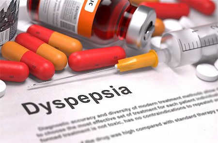 Diagnosis - Dyspepsia. Medical Report with Composition of Medicaments - Red Pills, Injections and Syringe. Selective Focus. Stock Photo - Budget Royalty-Free & Subscription, Code: 400-08282622