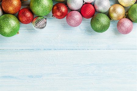 Christmas wooden background with colorful baubles Stock Photo - Budget Royalty-Free & Subscription, Code: 400-08295883