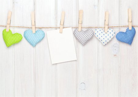 simsearch:400-07919385,k - Photo frame and valentines toy hearts over wooden background Stock Photo - Budget Royalty-Free & Subscription, Code: 400-08298154