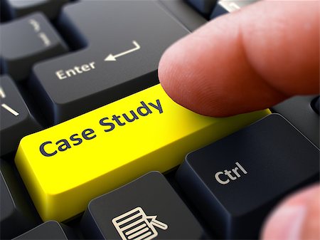 simsearch:400-07337983,k - Case Study Button. Male Finger Clicks on Yellow Button on Black Keyboard. Closeup View. Blurred Background. Stock Photo - Budget Royalty-Free & Subscription, Code: 400-08298990