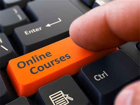 simsearch:400-06744483,k - Online Courses Orange Button - Finger Pushing Button of Black Computer Keyboard. Blurred Background. Closeup View. Stock Photo - Budget Royalty-Free & Subscription, Code: 400-08291022