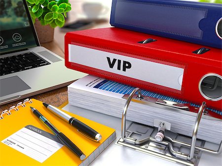 Red Ring Binder with Inscription VIP - Very Important Person - on Background of Working Table with Office Supplies, Laptop, Reports. Toned Illustration. Business Concept on Blurred Background. Photographie de stock - Aubaine LD & Abonnement, Code: 400-08291043