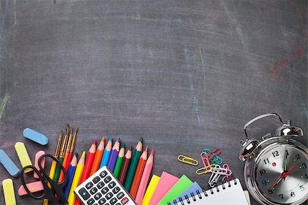 School and office supplies on blackboard background. Top view with copy space Stock Photo - Budget Royalty-Free & Subscription, Code: 400-08291306