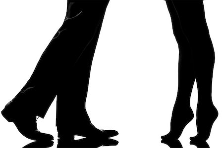 one  detail legs feet couple man and woman tiptoe lovers teenderness in studio silhouette isolated on white background Foto de stock - Super Valor sin royalties y Suscripción, Código: 400-08315413