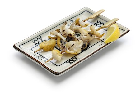 grilled skewered whelks, japanese food isolated on white background Stock Photo - Budget Royalty-Free & Subscription, Code: 400-08315652