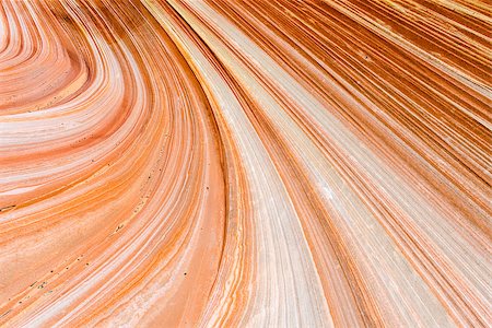 The Wave is an awesome vivid swirling petrified dune sandstone formation in Coyote Buttes North. It could be seen in Paria Canyon-Vermilion Cliffs Wilderness, Arizona. USA Stock Photo - Budget Royalty-Free & Subscription, Code: 400-08315674