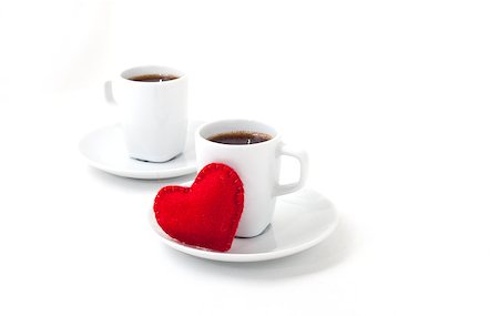 Two cups of coffee with felt heart for Valentine's Day on White Background. Stock Photo - Budget Royalty-Free & Subscription, Code: 400-08331972