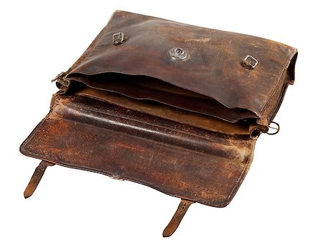 empty suitcase - Opened old leather briefcase is lying on the ground. Photo isolated on white background. Stock Photo - Budget Royalty-Free & Subscription, Code: 400-08333270