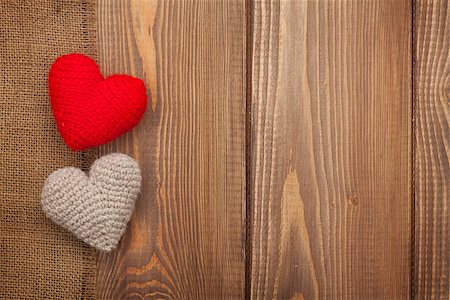 simsearch:400-07919385,k - Valentines day background with handmade toy hearts over wooden table Stock Photo - Budget Royalty-Free & Subscription, Code: 400-08346936