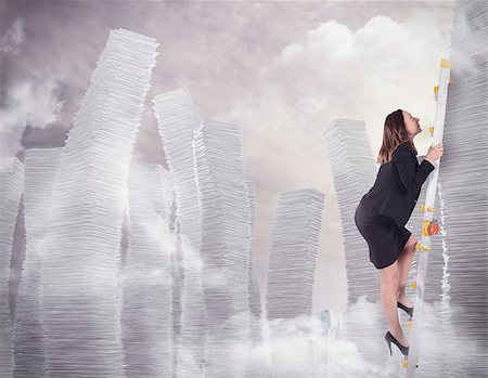 Businesswoman climbs on scale of sheets piles Stock Photo - Budget Royalty-Free & Subscription, Code: 400-08340452