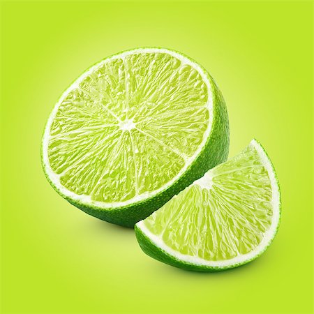 simsearch:400-06513460,k - Half and slice of lime citrus fruit with clipping path Stock Photo - Budget Royalty-Free & Subscription, Code: 400-08341545