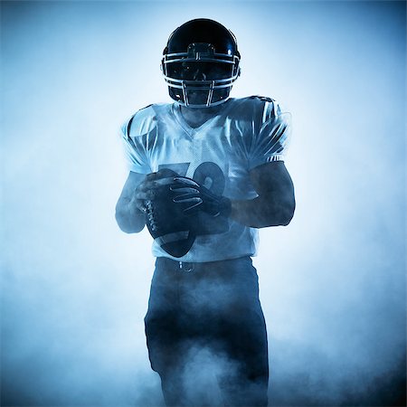 football player action not soccer - one american football player portrait in silhouette shadow on white background Stock Photo - Budget Royalty-Free & Subscription, Code: 400-08343038