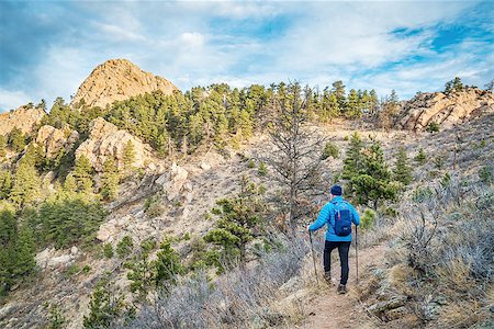 rockies foothills - mail hiker with a backpack on a trail to Horsetooth Rock, a landmark of Fort Collins, Colorado, winter scenery without snow Stock Photo - Budget Royalty-Free & Subscription, Code: 400-08343538