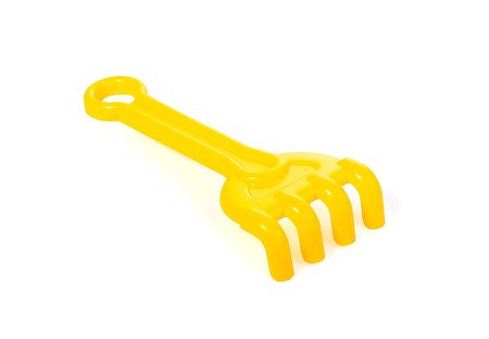 simsearch:400-04423521,k - yellow plastic children's toy rake for the sandbox isolated on white background Photographie de stock - Aubaine LD & Abonnement, Code: 400-08372461