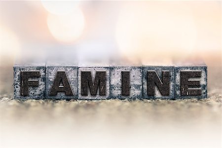 refugee - The word "FAMINE" written in vintage ink stained letterpress type. Stock Photo - Budget Royalty-Free & Subscription, Code: 400-08404791