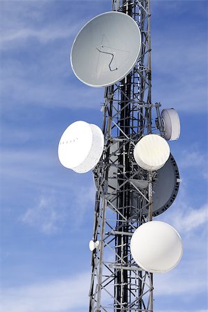 dish satellite tower - Satellite dishes against blue winter sky Stock Photo - Budget Royalty-Free & Subscription, Code: 400-08405613