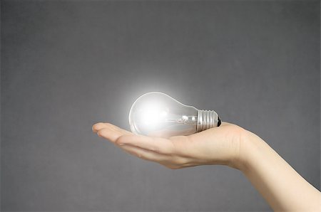 simsearch:400-04265413,k - Creativity concept. Hand holding a glowing light bulb. Stock Photo - Budget Royalty-Free & Subscription, Code: 400-08409803