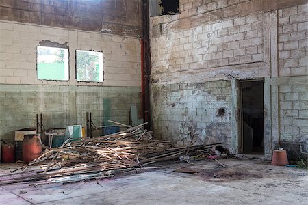 simsearch:859-03983026,k - Interior of an abandoned cellar with details of wear and tear by time. You can see flashes of sunlight that enter through gaps and windows. Stock Photo - Budget Royalty-Free & Subscription, Code: 400-08401849