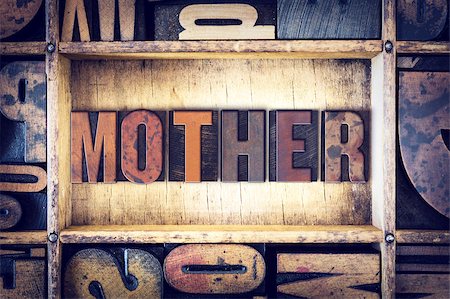 The word "Mother" written in vintage wooden letterpress type. Foto de stock - Super Valor sin royalties y Suscripción, Código: 400-08410183