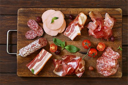 simsearch:400-06207145,k - Assorted deli meats - ham, sausage, salami, parma, prosciutto, bacon Stock Photo - Budget Royalty-Free & Subscription, Code: 400-08427812